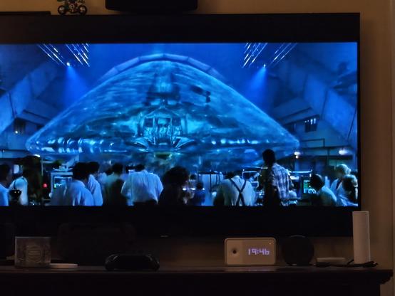 picture of my TV with ID4 playing as they try to shoot the coke can off the alien ship and the shield prevents it.