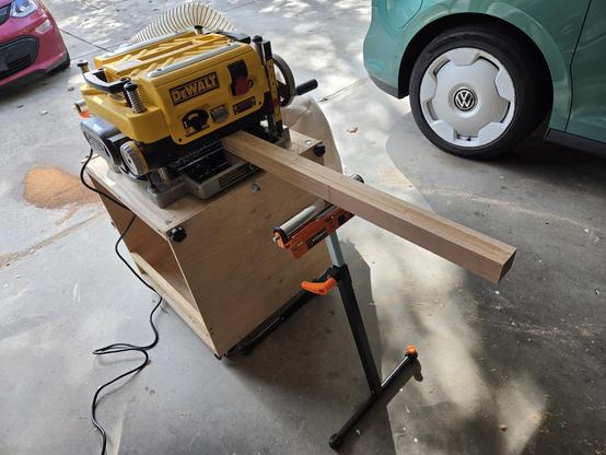 one of the table legs going through my DeWalt 735 planer.
