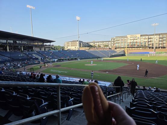 picture of a baseball field from the first base stands.  a game is in progress.  the stripers are in the field and Indianapolis is batting.