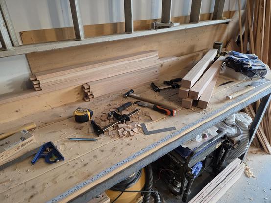 all the legs and cross-members with tenons on each end.  everything is in neat stacks.
