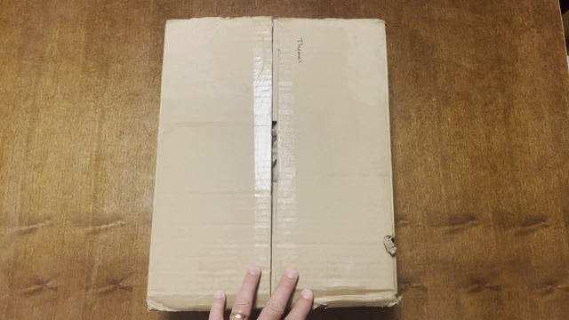A video of me opening a cardboard box. Opening it reveals a handwritten note on the inside of the flaps: "Thank you Thomas!" on one and "Much love from Montreal ♥" on the other. Inside a sticker sits on top: Memento Cycles.