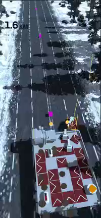 a portrait oriented overhead view of a long highway, a large vehicle with several "upgrade spots" coasts along at incredible speed, harrassed by smaller vehicles. 

Some upgrades resemble fuel tanks, others weapons, one kinda looks like a cheese platter for want of a better word. 

prototype and placeholder art everywhere.