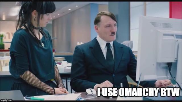 scene from the movie "Look Who's Back", hitler is sitting in front of a computer, a contemporary human standing next to him, caption "i use omarchy btw"