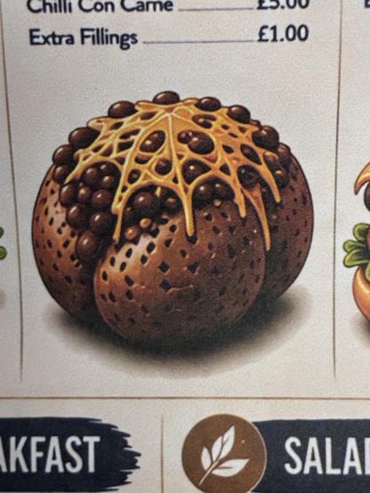 A photo of an AI slop jacket potato. 

I’m not going to give it too much detail. But it looks like a mutant potato that’s setting off my trypophobia, with a spider web of cheese and mystery spheres for beans on it