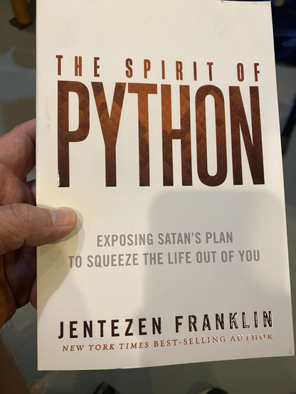 Book with title "The Spirit of Python: Exposing Satan's Plan to Squeeze the Life Out of You" by Jentezen Franklin.