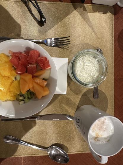 A vibrant breakfast bowl of fresh fruit and yoghurt