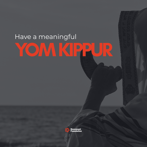 A black and white image of a figure blowing a horn over the sea, with Hebrew characters visible on their hood, fills the background. 

Over the image, text reads: Have a meaningful Yom Kippur. Newsmast Foundation.