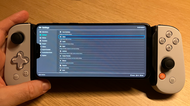 A OnePlus 6 with a controller attached on each side, making the whole thing into a portable gaming device, larger than a PSP, smaller than a Steam Deck.