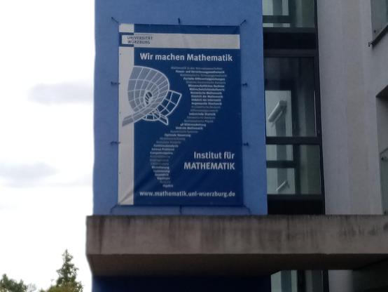 Welcome sign to department: Wir machen Mathematik