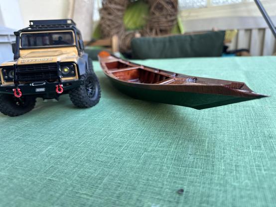 Landrover defender and sandolo model from the front.