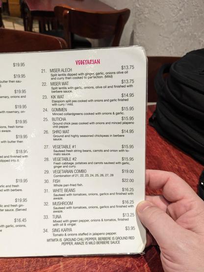 The vegetarian section of the menu includes seafood dishes.