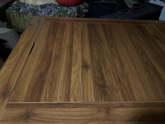 A picture of the table with the lid covering the chess set. I am over the moon.