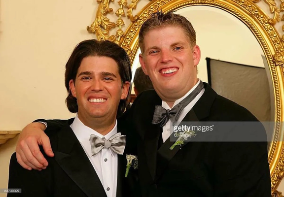 Actual photo of Don Junior and Eric Trump from Don Jr’s first marriage. The brothers have very goofy and ‘toothy’ smiles, exposing too much of their gum line. It has been noted that the figure might be digitally altered, but numerous photos of Eric Trump especially look essentially the same.