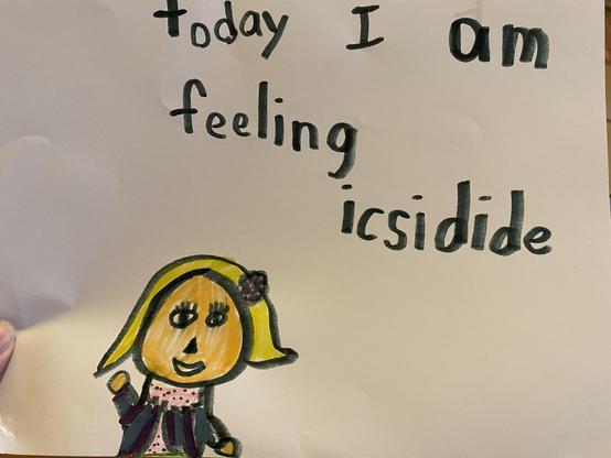 Drawing from a 6yo reading “today I am feeling icsidide” including a self-portrait of the artist, smiling up from the bottom of the page.