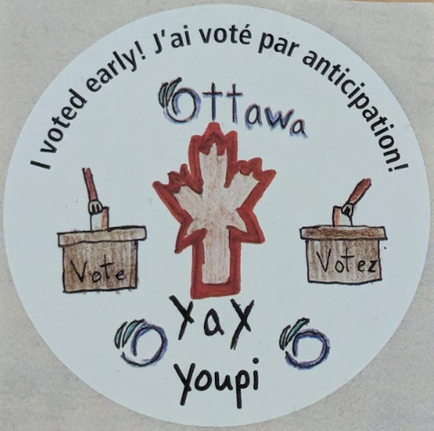 A round sticker that says "I voted early! J'ai voté par anticipation!" following the top perimeter. Below that is a child's drawn picture that looks primarily like black marker borders filled by coloured pencil. Their image features the City of Ottawa logo with it's stylized "O". A red maple leaf below that with ballot boxes to either side. An arm is reaching in from above on both, dropping ballots into the boxes. Below these things are two stylized Ottawa O's  with the words "yay" and "youpi" printed between them.