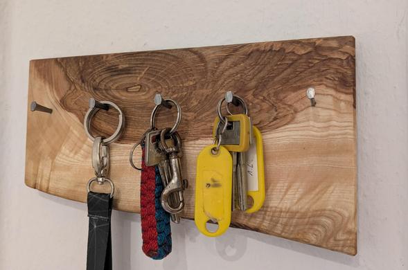 Key holder holding keys on the nails