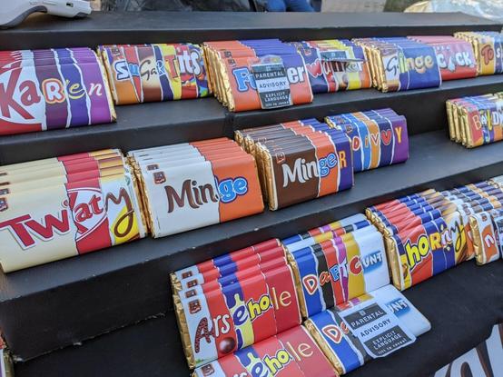 Bizarre candy bars made up of fragments of wrappings of other candy bars: MINGE. TWATTY. ARSEHOLE