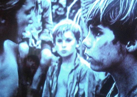 Simon and Ralph arguing;  A scene from the1963  film, “Lord Of The Flies” directed by Peter Brook; adapted from the book of the same name by William Golding. 

source https://flickr.com/photos/bootload/4499620914/
             https://www.imdb.com/title/tt0057261