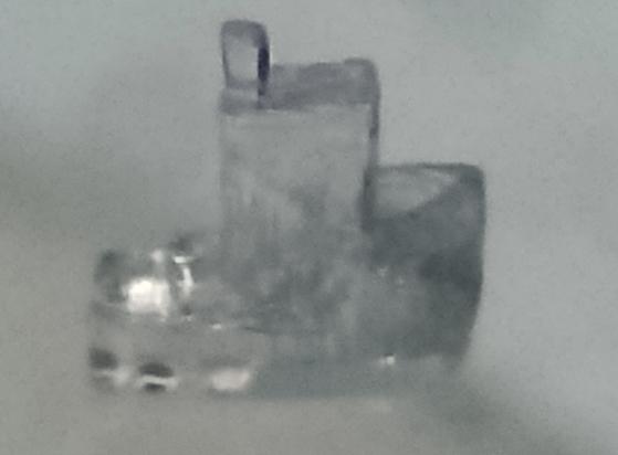 A clear, very tiny, 3D printer benchmark boat model.