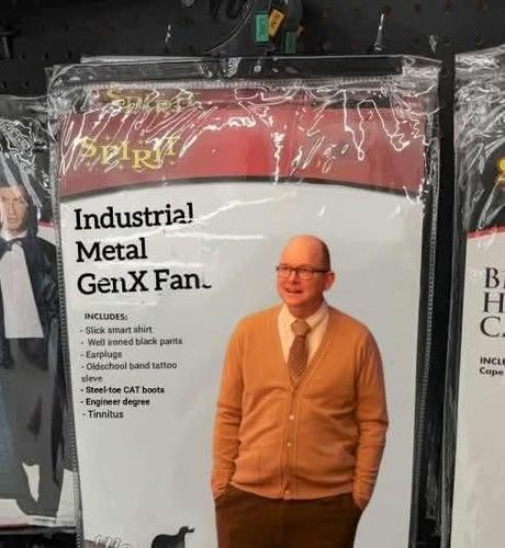 A Halloween costume showing a balding, older man wearing glasses, a comfy sweater, a tie, and brown pants.

It’s labeled: “Industrial Metal GenX Fan”