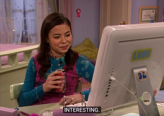 That meme of Megan from "Drake and Josh" holding a can of soda and wearing a slight smile as she looks at her computer screen.