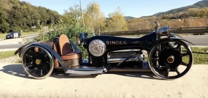 Photo of a custom 3-wheel motor vehicle modded to resemble an antique Singer sewing machine.