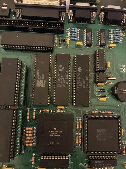 A pair of R65NC22P2s installed into the main board, next to an SCC.