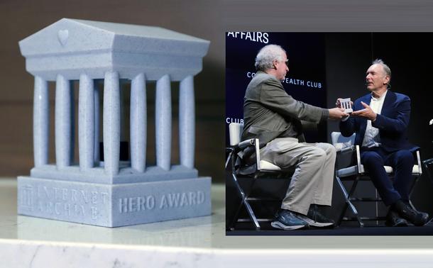 Internet Archive Hero Award by Taekyeom Lee: a speckled blue-gray temple statue with a heart

Brewster Kahle hands Tim Berners-Lee the Internet Archive Hero Award statue while seated on stage

Hero Award statue by Taekyeom Lee beside Brewster Kahle presenting it to Tim Berners-Lee on stage