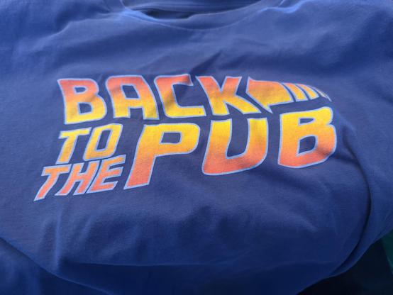 T-shirt with “back to the pub” on it.