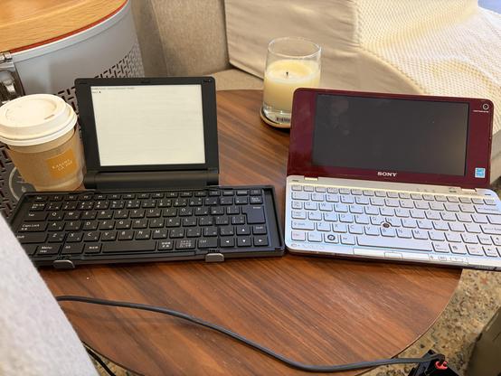 A Pomera DM30 next to a similarly sized Sony Vaio UMPC