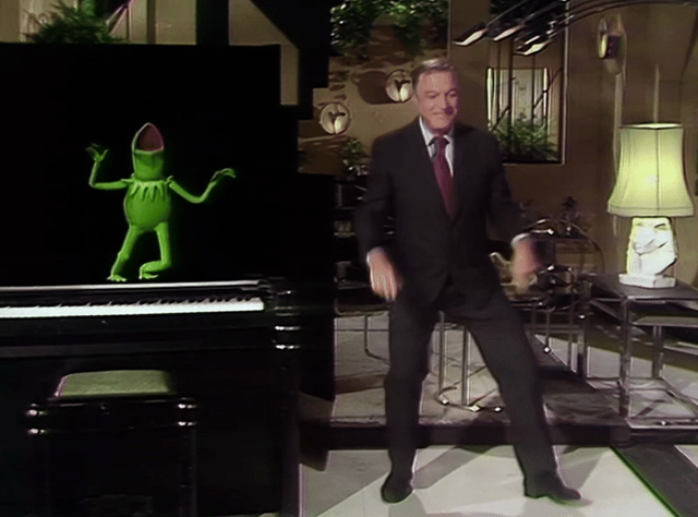 GIF of Kermit the Frog and Gene Kelly tap dancing