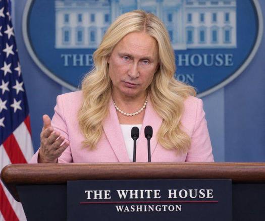 The stereotypical blonde republican puppet, dressed in pink with white blouse and a single row of pearls, standing behind a lectern saying "The White House, Washington".

Except that particular blonde has Putin's face under her long hair.