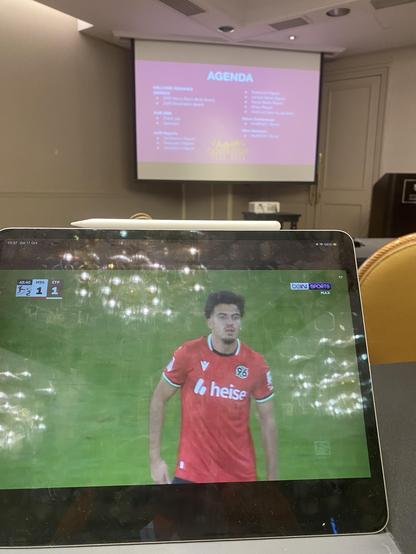 AGM slides and the Hannover 96 match.