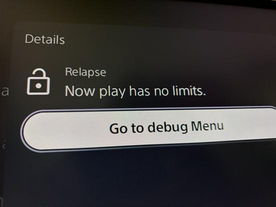 Close-up of a dark screen displaying “Details” and a “Battery” section, with part of a battery graphic visible.