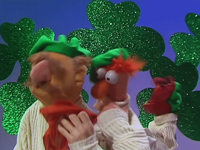 GIF of The Swedish Chef, Beaker, and Animal as The Leprechaun Brothers all crying after singing Danny Boy in Irish costumes