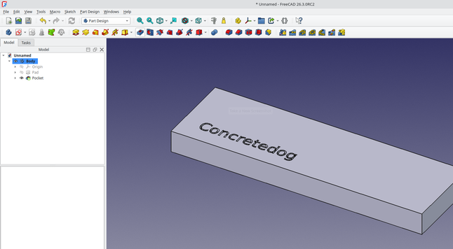 FreeCAD, in the preview window there is an extruded rectangle with "Concretedog" debossed into it.