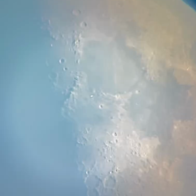 27-second video closeup of the lunar surface, featuring the terminator line running through Archimedes Crater and the Montes Apenninus mountain range to the west of the Sea of Serenity. Three small white specks, likely Starlink satellites, rapidly cross over the terrain from left to right in a straight, diagonally upward path.

Shot on an iPhone 15 attached to a Celestron 130mm-aperture reflector telescope.