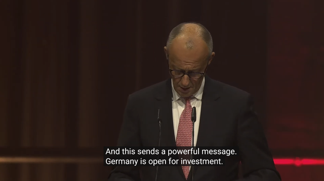 Screenshot Eröffnungsrede F. Merz. Caption: "And this sends a powerful message. Germany is open for investment."