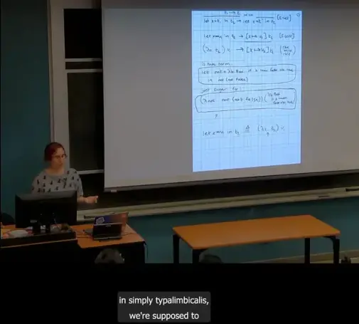 A screenshot from the classroom lecture capture system from my grad PL class earlier today. I'm saying the words "simply typed lambda calculus", but the automatic captioning system is emitting "simply typalimbicalis"