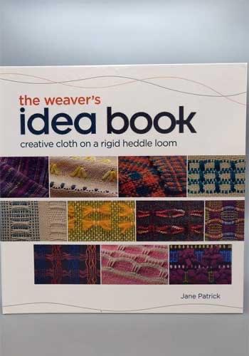 A book titled "The Weaver's Idea Book" by Jane Patrick, featuring a collage of colorful woven patterns on the cover.