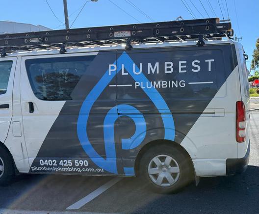 This plumbing business’s van spells out the company name: Plumbest Plumbing