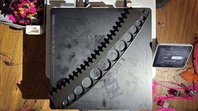 30 degree portion of an enormous ring gear that entirely fills the 3d printer plate. a little hangs off in places