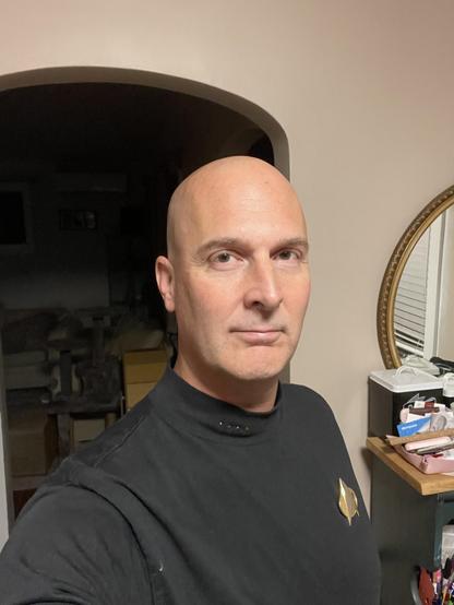 similar but no jacket and pin direct on turtleneck