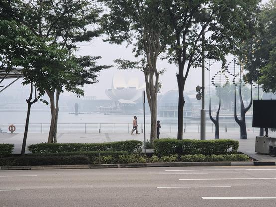 Buildings in the distance in what looks like fog